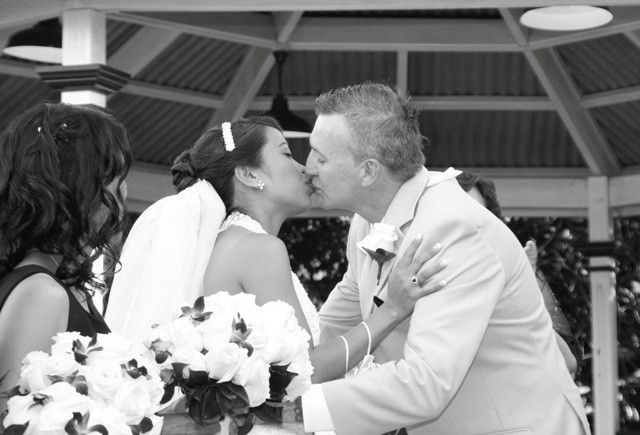 Sealing their vows with a kiss